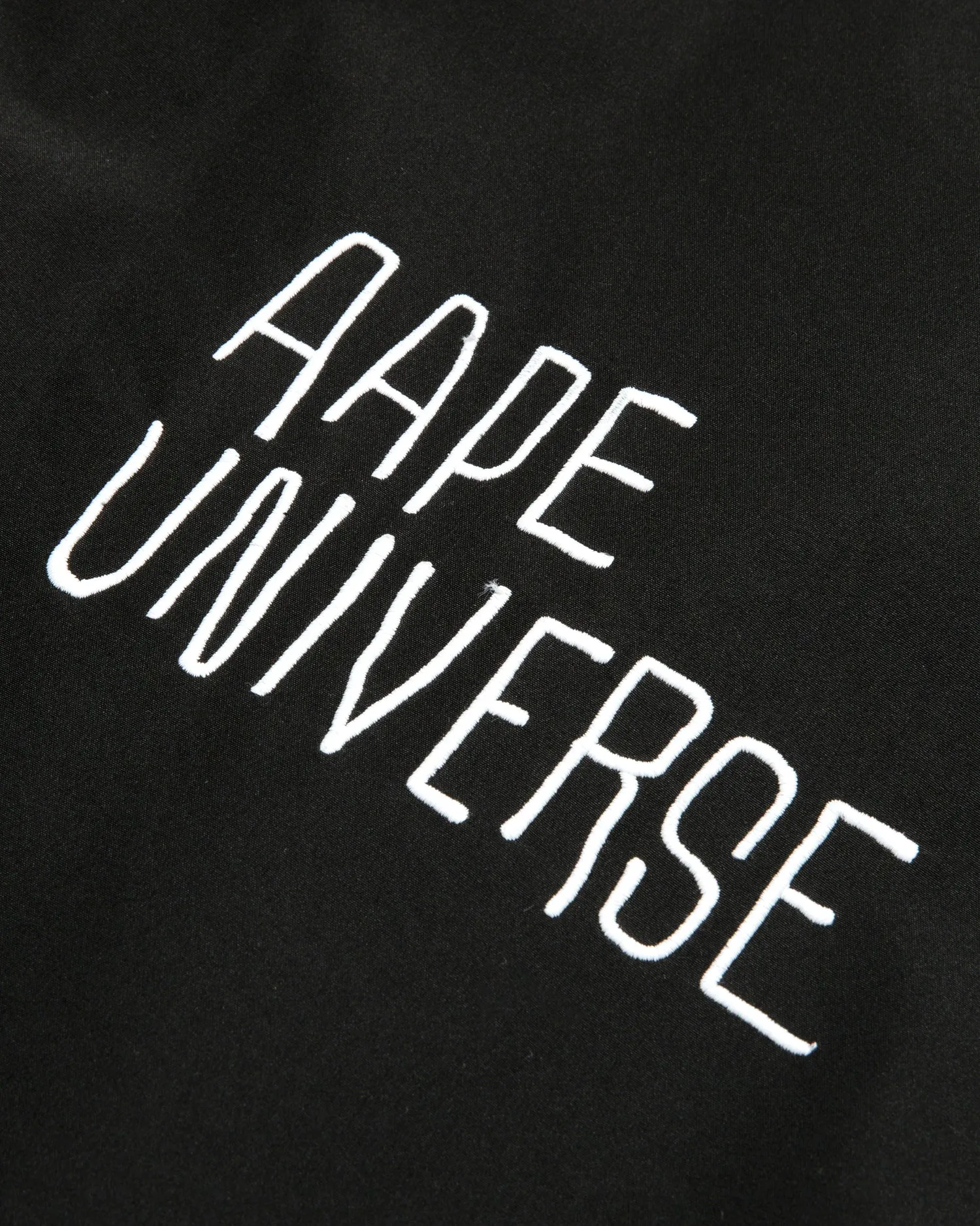 AAPEUNVS moonface logo windbreaker jacket