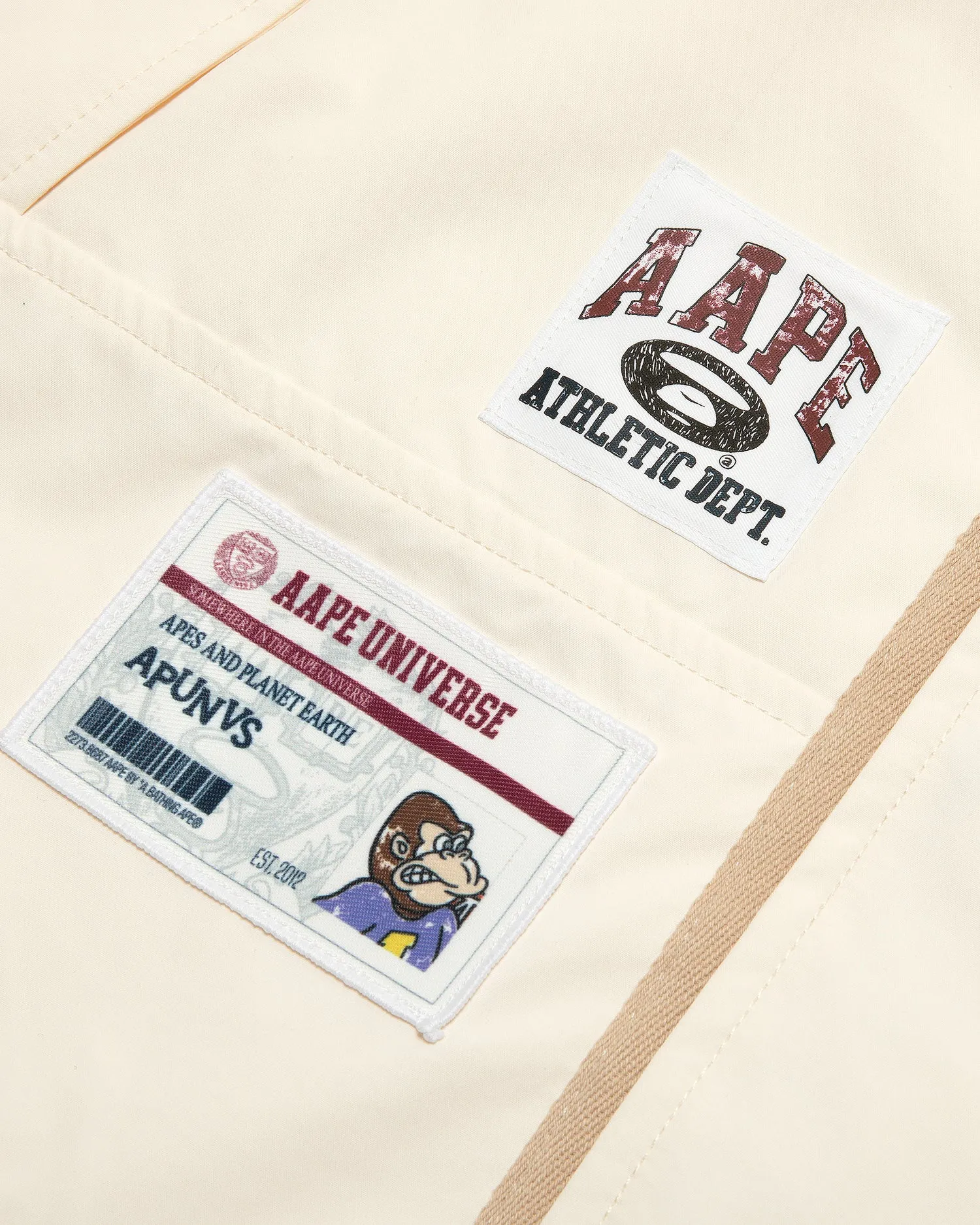 AAPEUNVS moonface logo windbreaker jacket