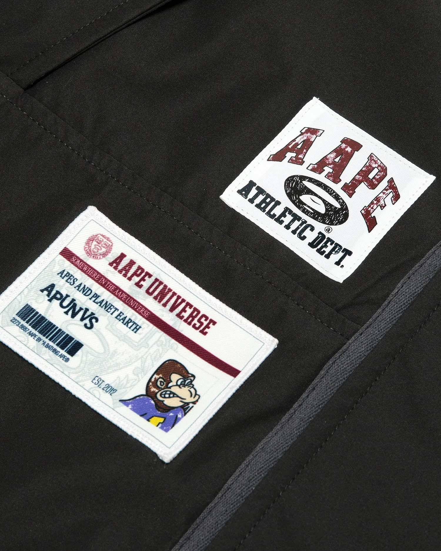 AAPEUNVS moonface logo windbreaker jacket