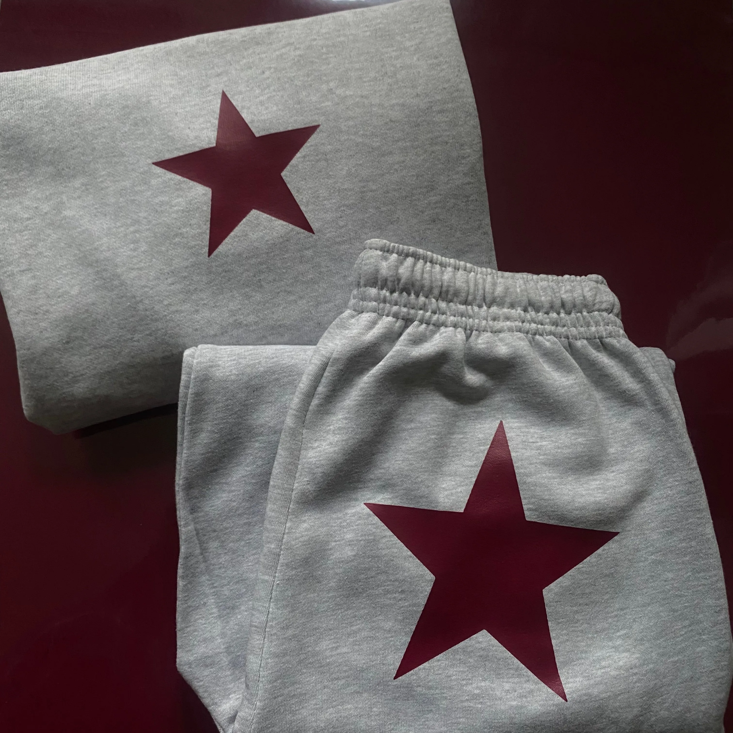 burgundy star tracksuit