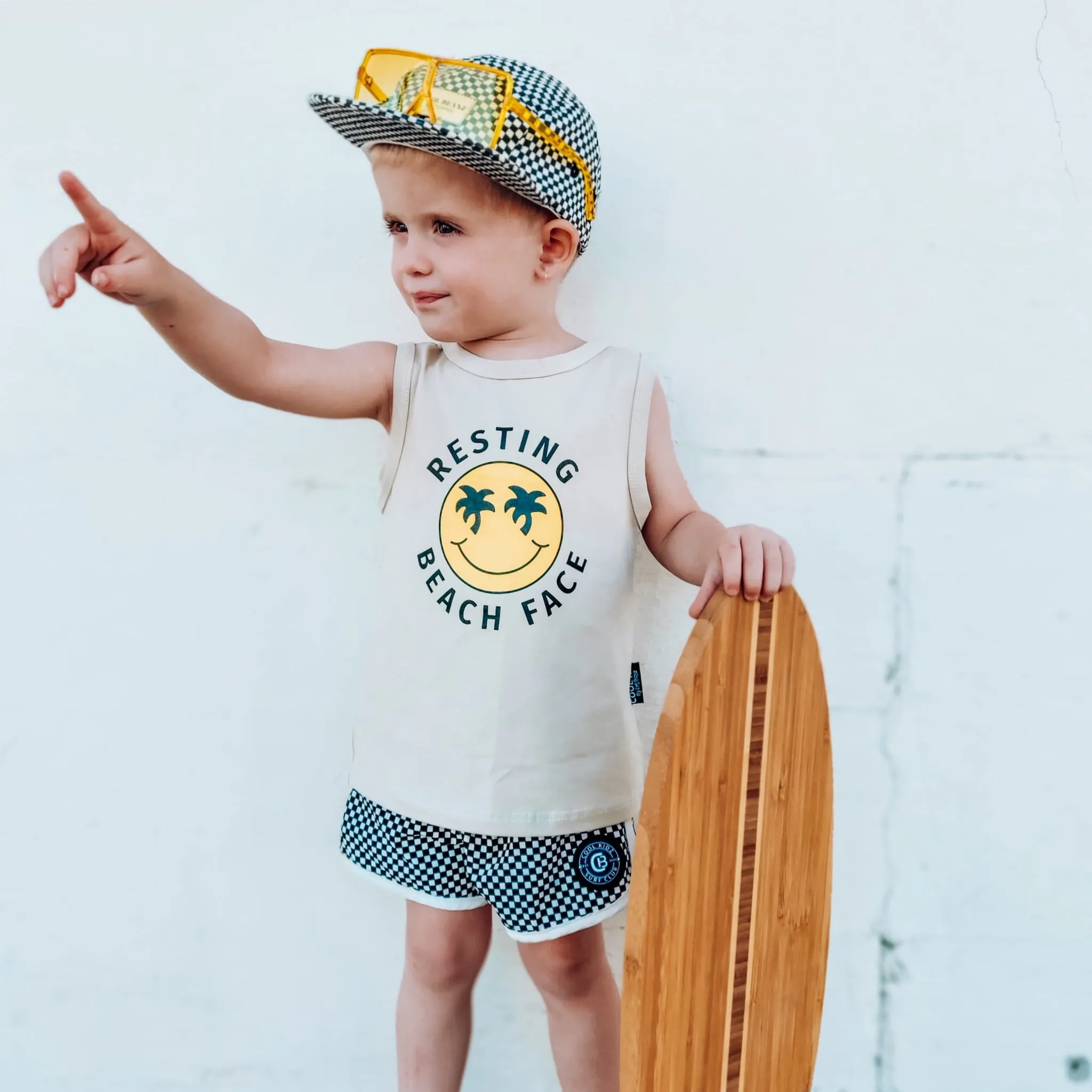 Resting Beach Face Muscle Tanks