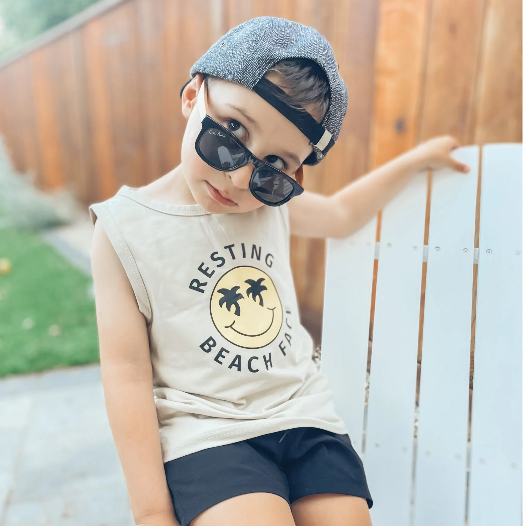 Resting Beach Face Muscle Tanks